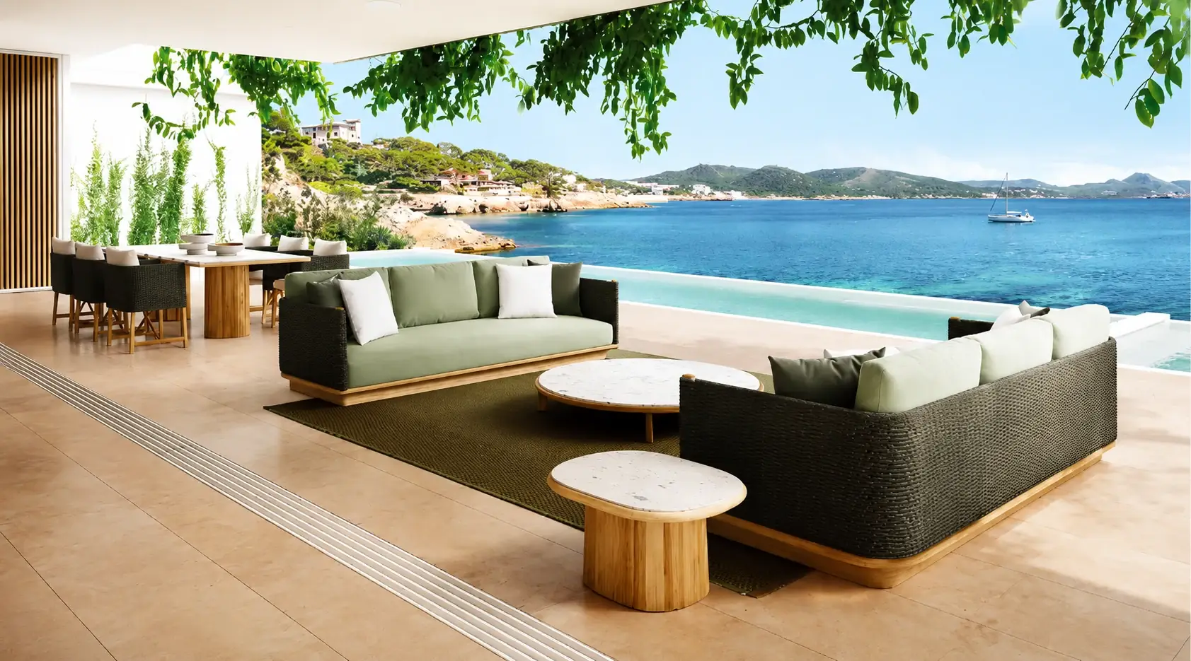 Green outdoor sofa on a stone terrace overlooking the sea