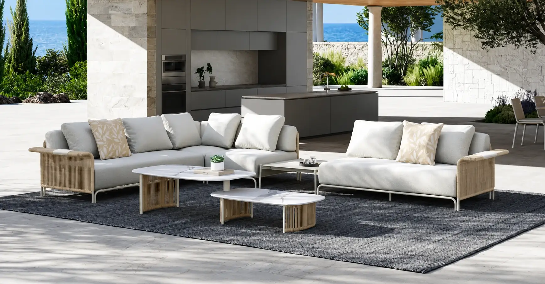 Cream outdoor sectional with coral cushions under a shaded terrace