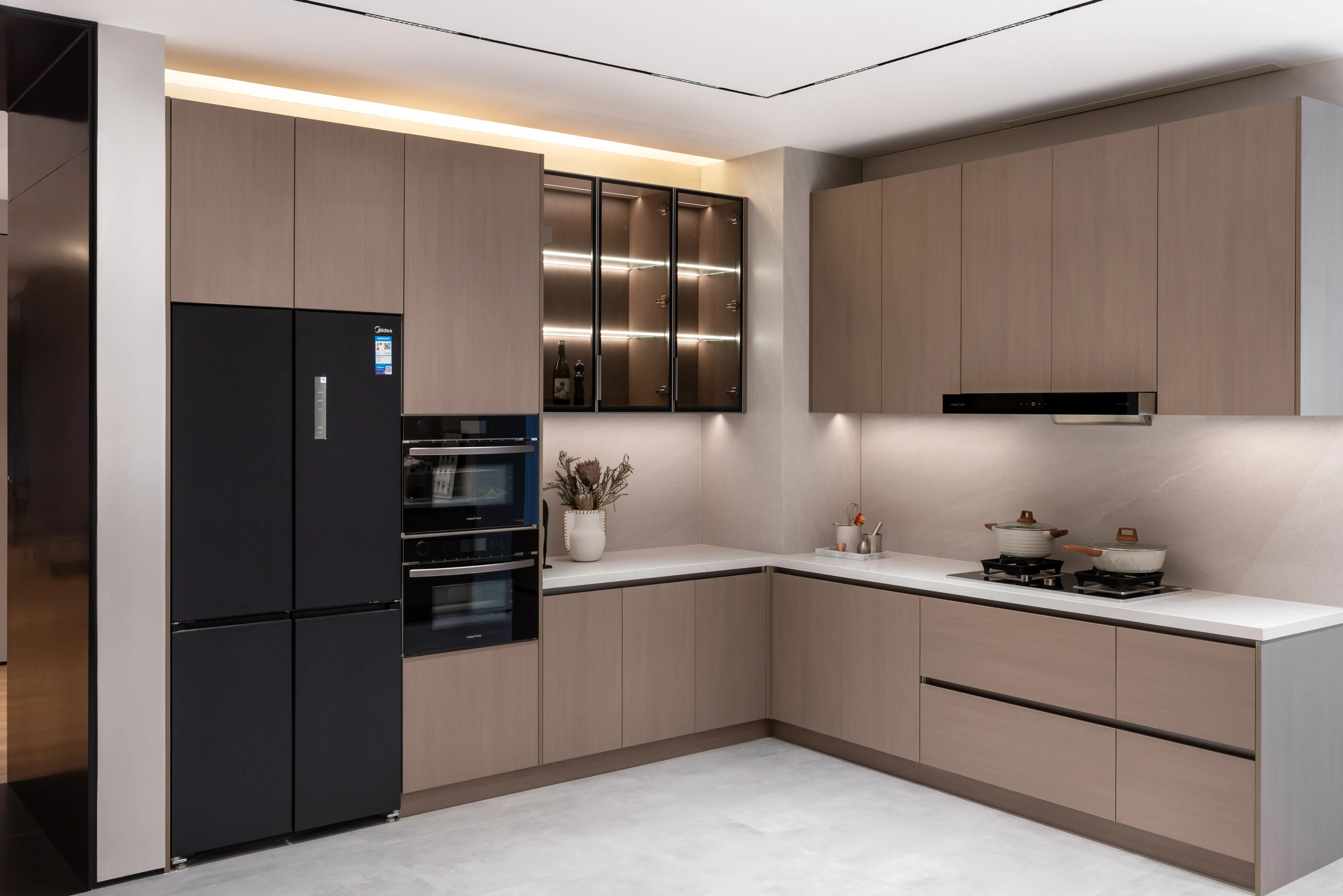 Charcoal L-shaped kitchen with a black appliance column
